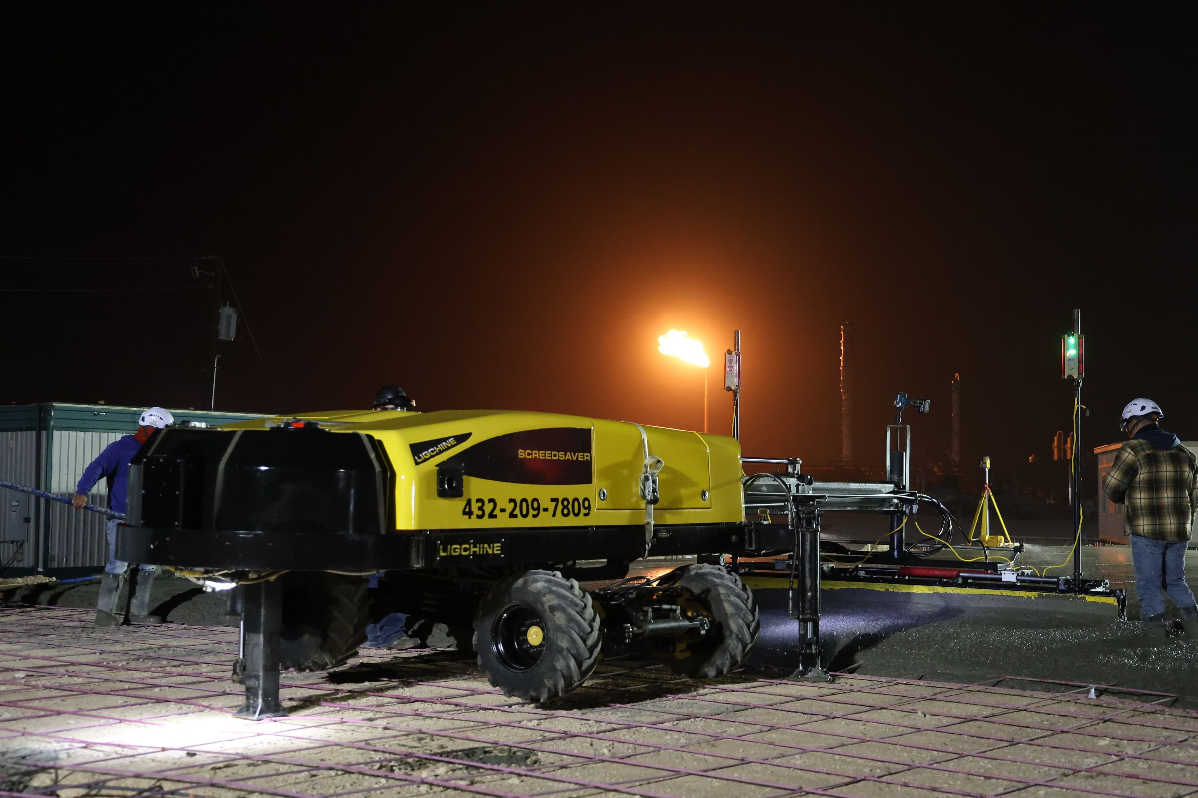 Concrete curb and gutter work on a commercial development site