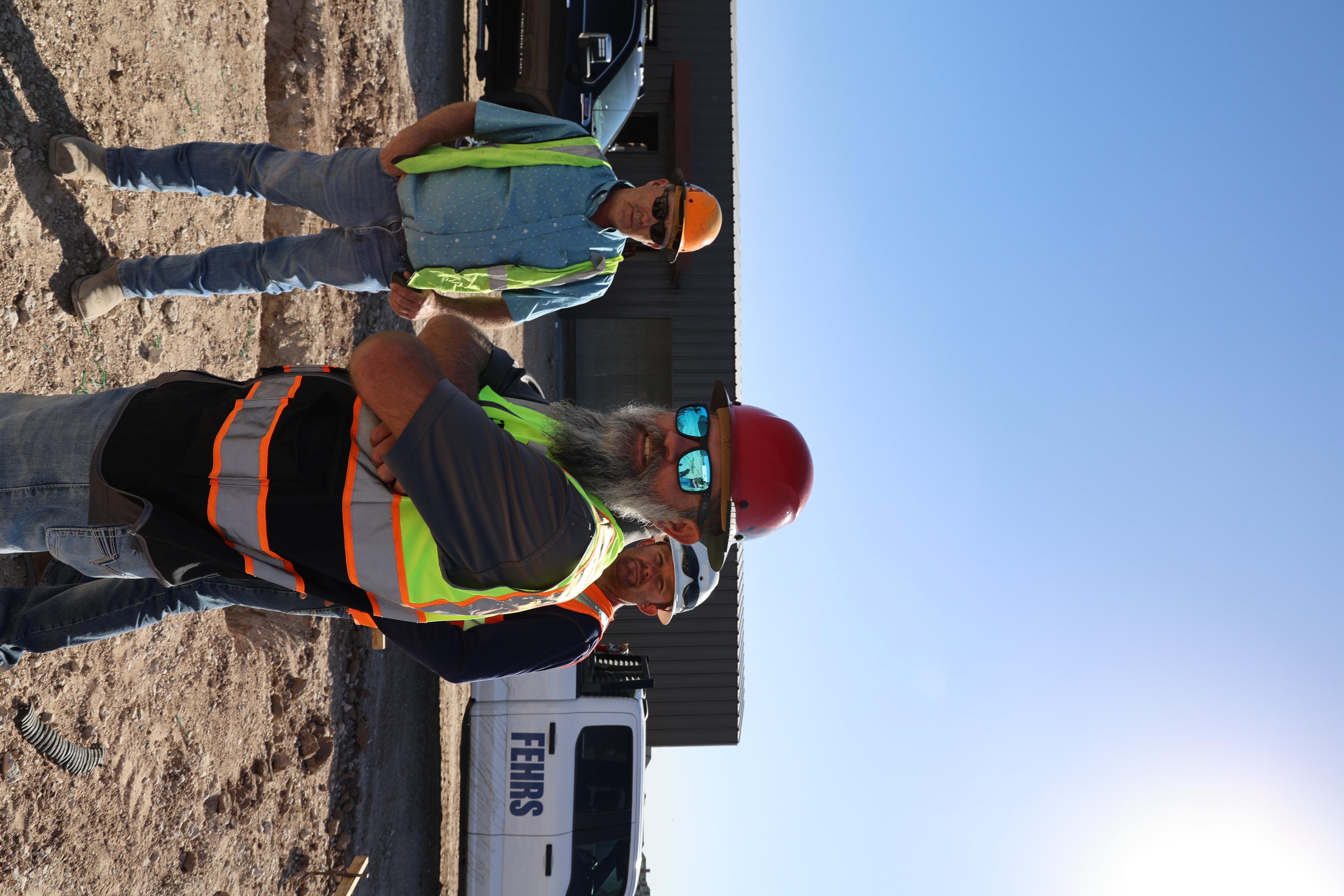 Precision Screeding crew on an active job site